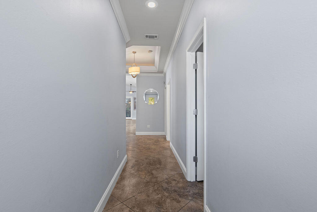 323 Main Street Destin, FL 32541 - Photo 12 of 43 a view of a livingroom from a hallway