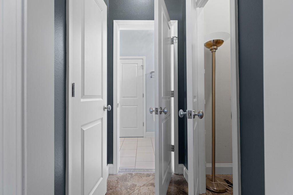 323 Main Street Destin, FL 32541 - Photo 16 of 43 a view of a bathroom from a hallway
