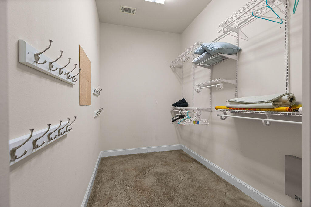 323 Main Street Destin, FL 32541 - Photo 40 of 43 a view of a room with rack and stairs