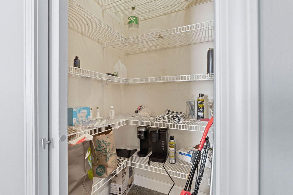 323 Main Street Destin, FL 32541 - Photo 42 of 43 a utility room with a sink and wooden floor