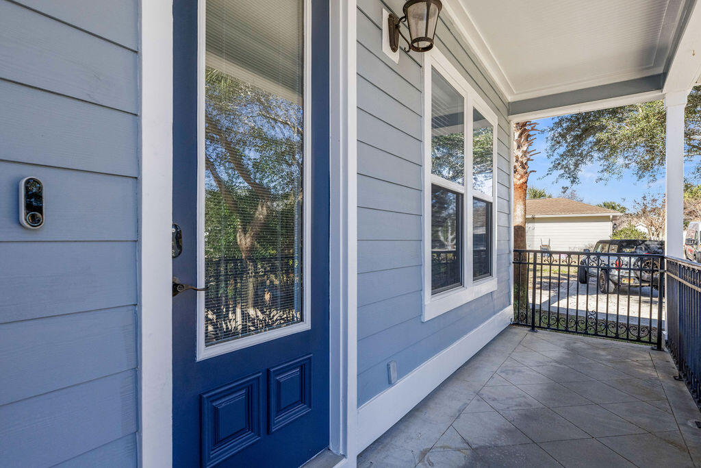 323 Main Street Destin, FL 32541 - Photo 7 of 43 a view of a house with a porch