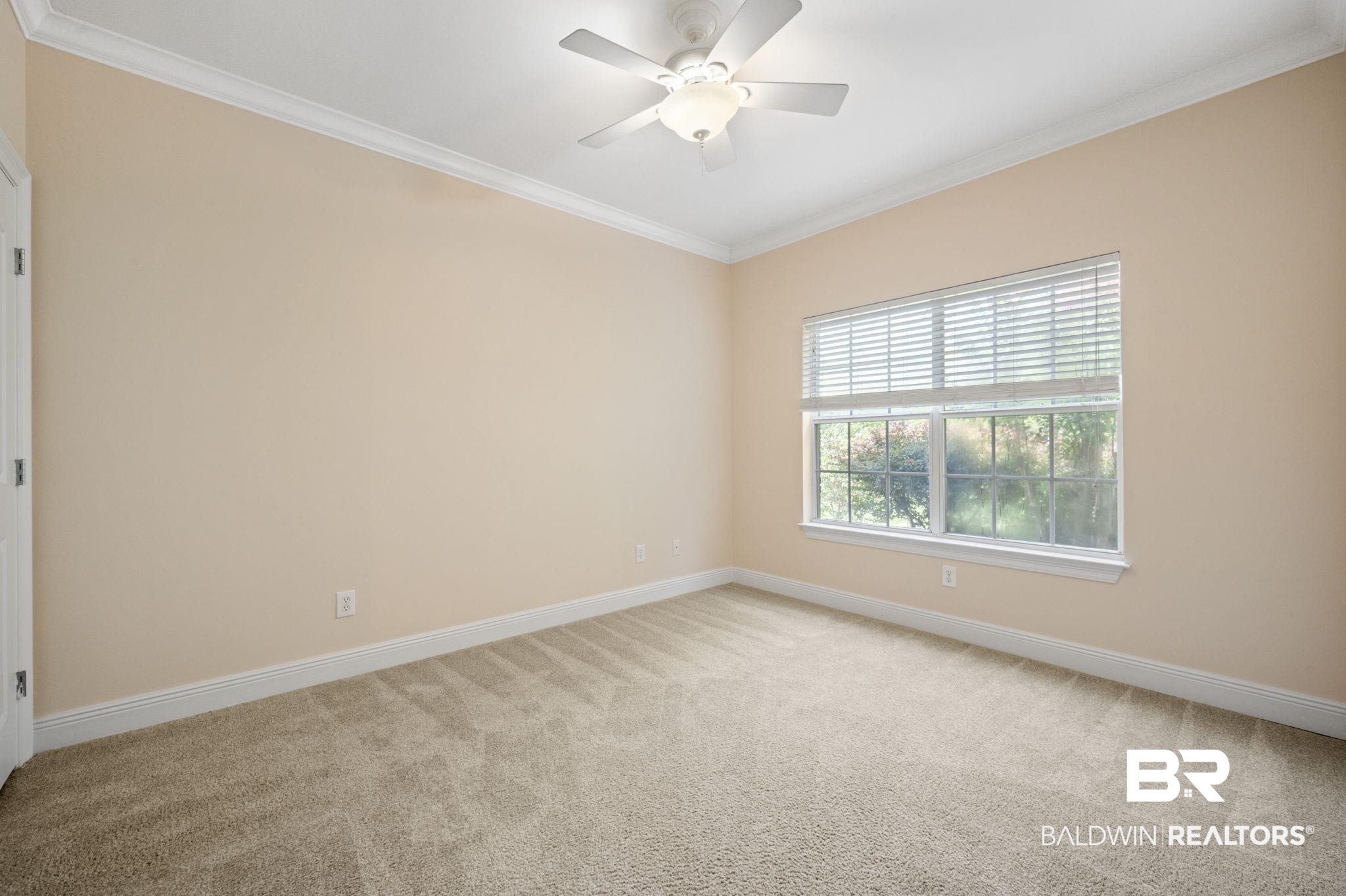 2041 Ridgeline Drive Mobile, AL 36695 - Photo 23 of 43 Carpeted empty room with ceiling fan and ornamental molding
