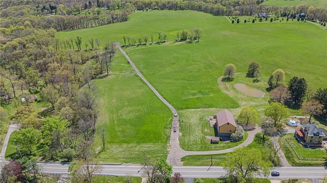 a view of a golf course with an ocean view