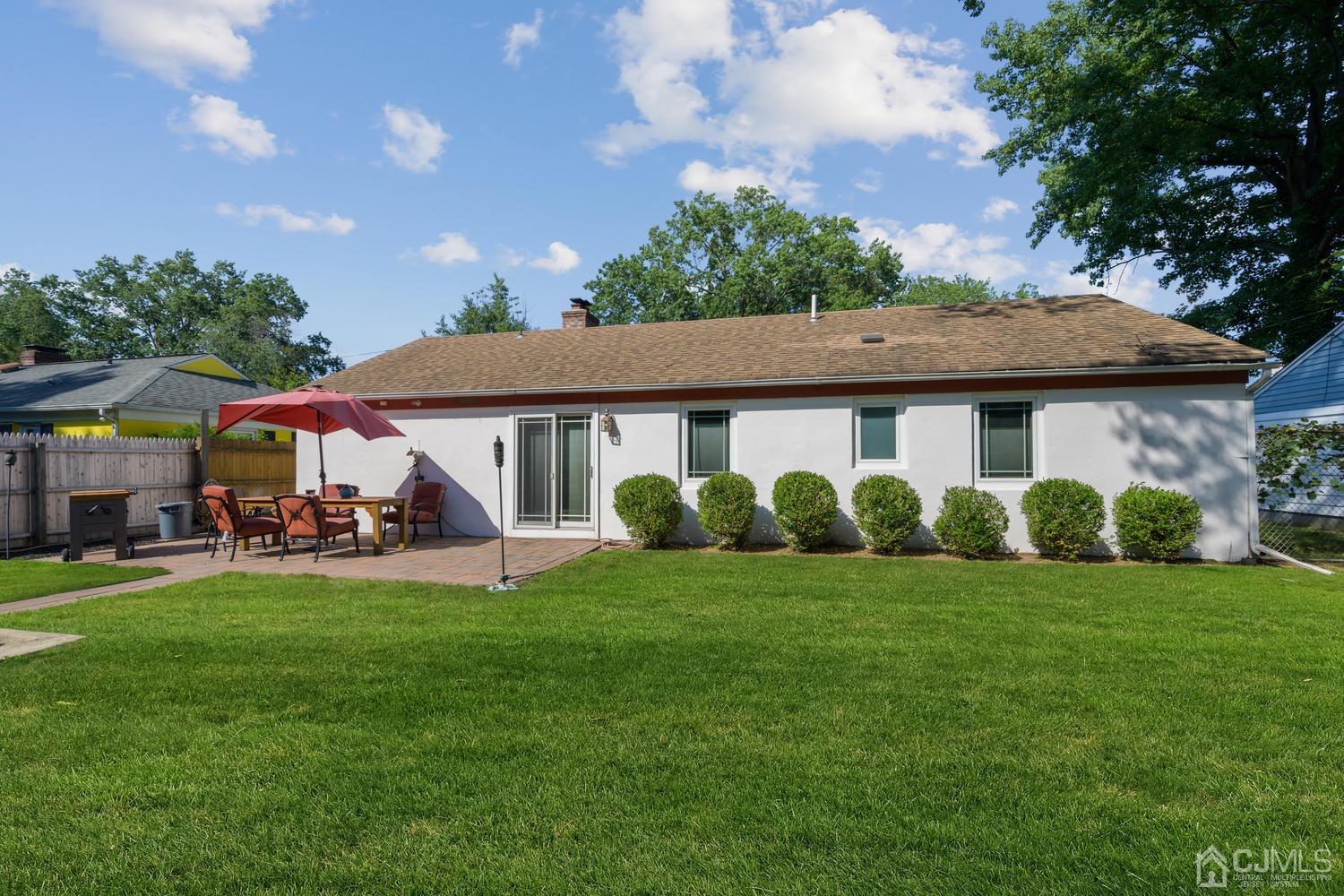 49 George Avenue Middlesex, NJ 08846 - Photo 19 of 20 a view of a house with a yard porch and sitting area