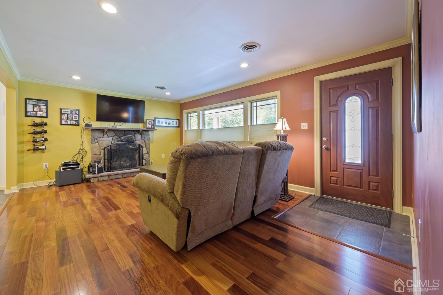 49 George Avenue Middlesex, NJ 08846 - Photo 4 of 20 a living room with furniture and a fireplace