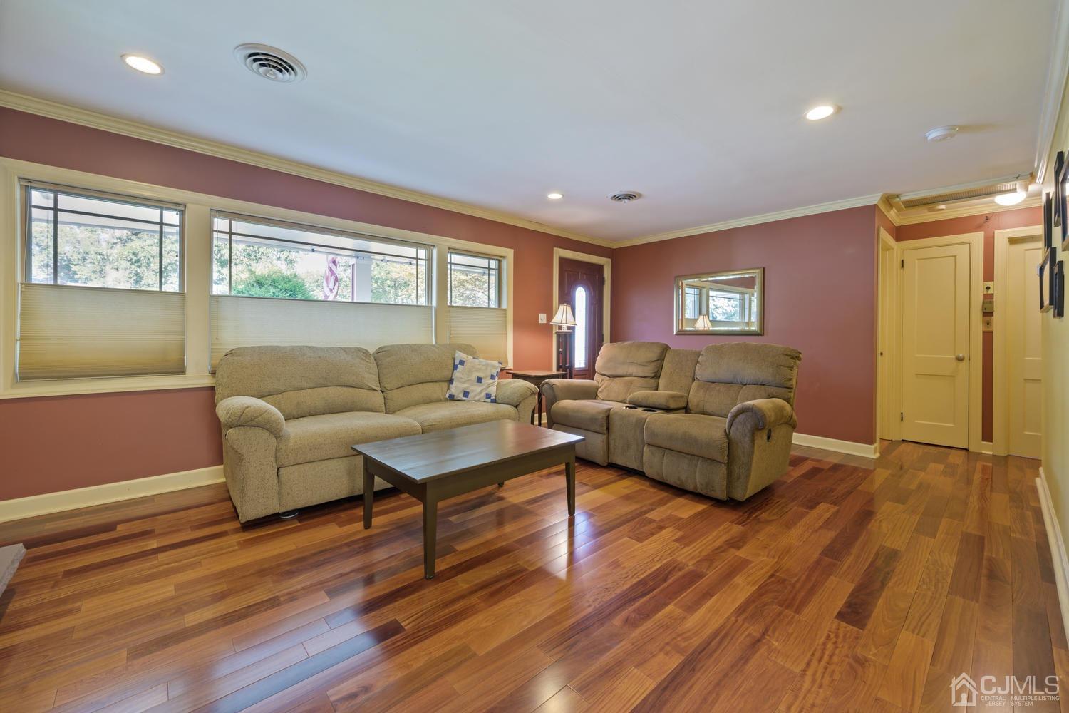 49 George Avenue Middlesex, NJ 08846 - Photo 5 of 20 a living room with furniture and a wooden floor