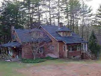 578 Main Road Monterey, MA 01245 - Photo 1 of 3 a front view of a house with a garden