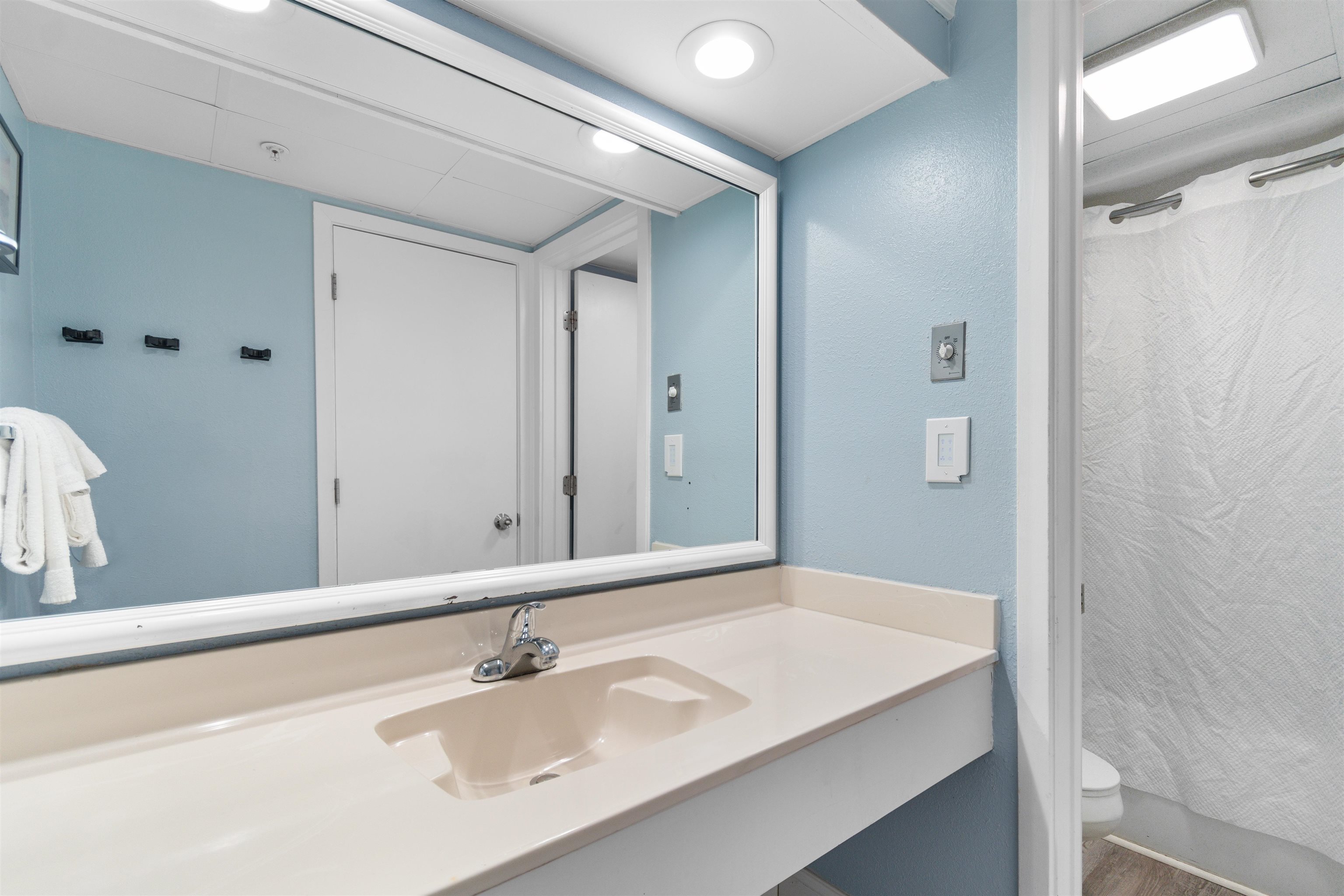 1501 South Ocean Boulevard, Unit 1237 Myrtle Beach, SC 29577 - Photo 15 of 40 Bathroom featuring vanity and shower / bath combination with curtain