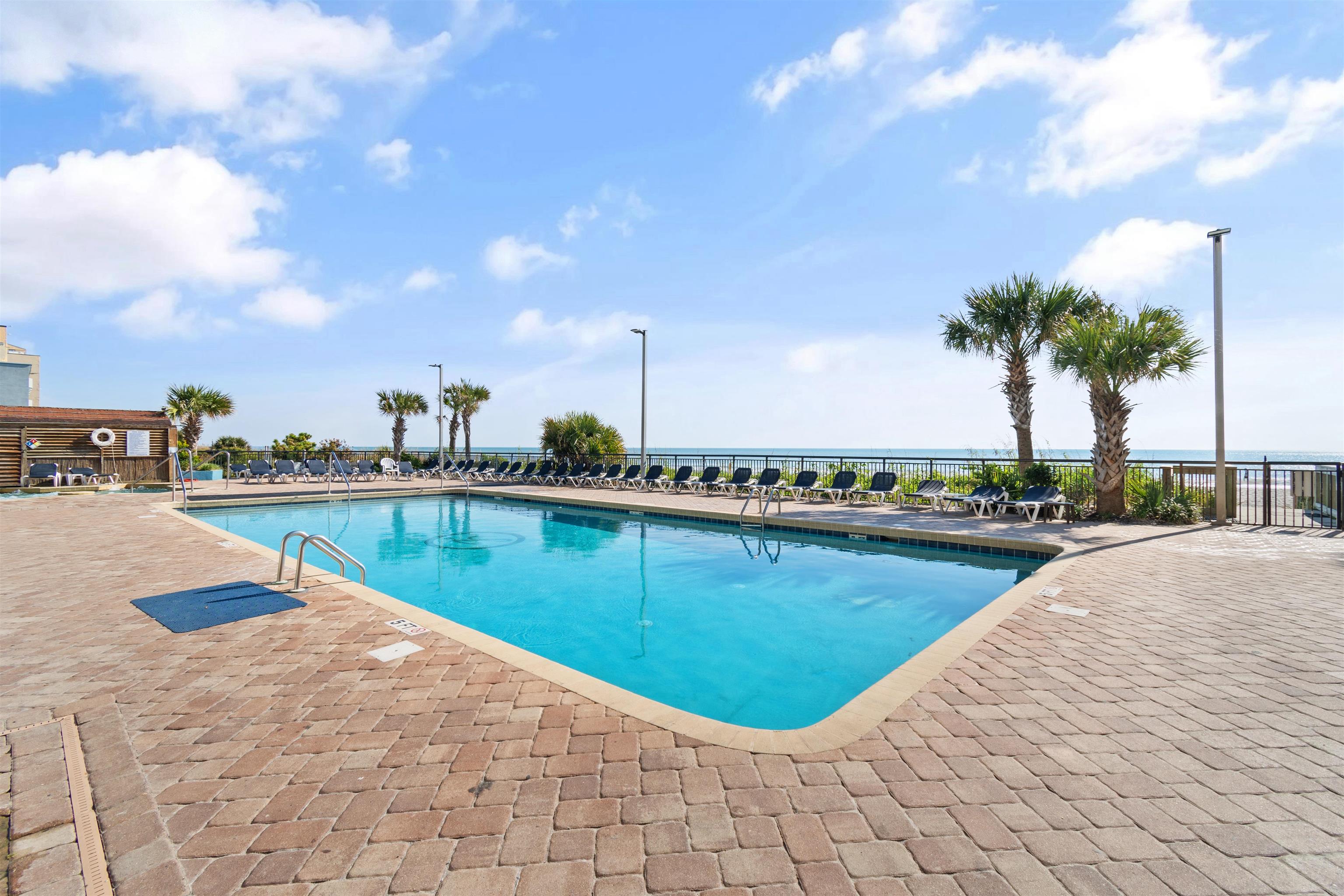1501 South Ocean Boulevard, Unit 1237 Myrtle Beach, SC 29577 - Photo 32 of 40 Community pool with a patio area