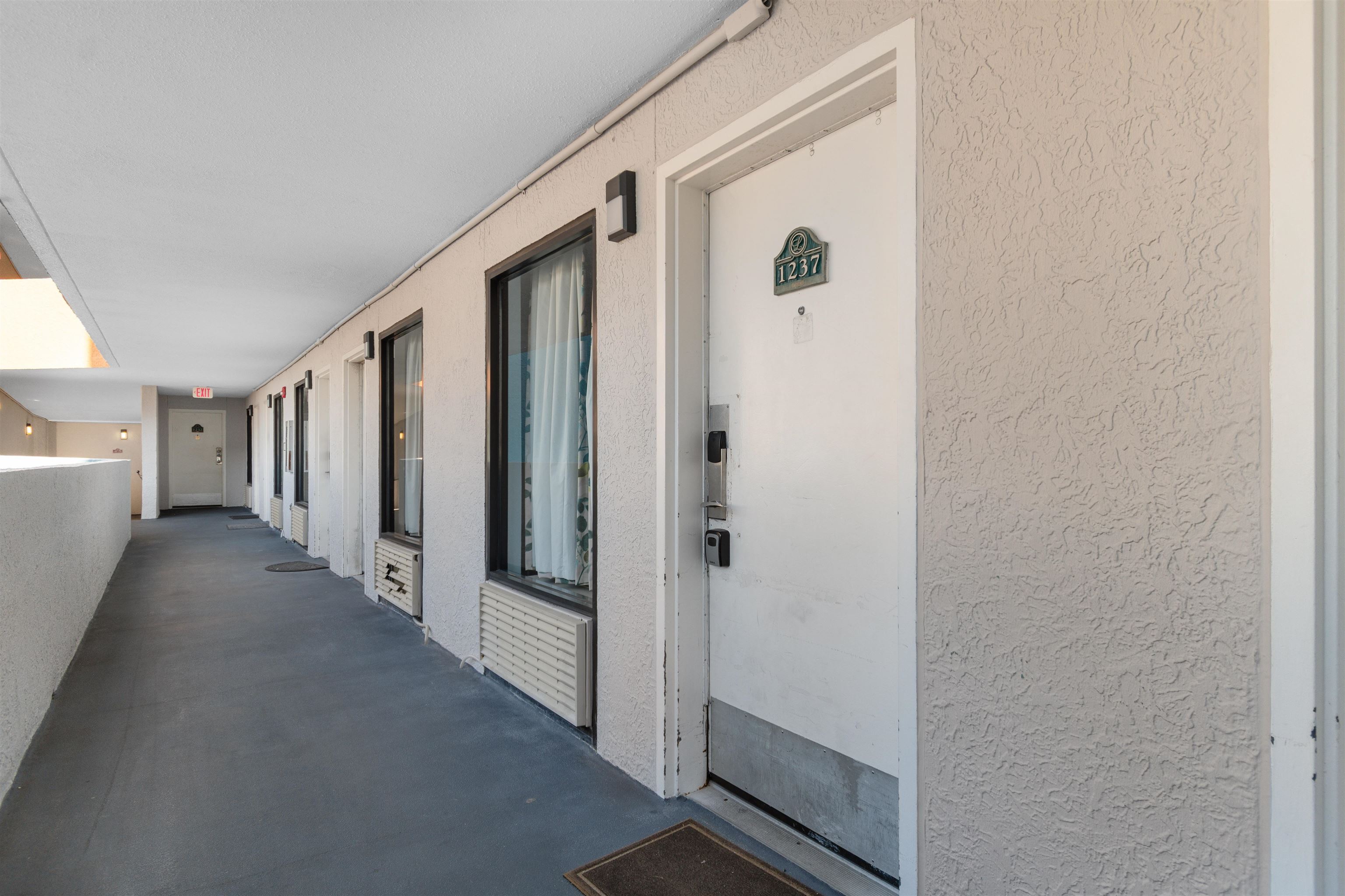 1501 South Ocean Boulevard, Unit 1237 Myrtle Beach, SC 29577 - Photo 4 of 40 View of exterior entry with stucco siding