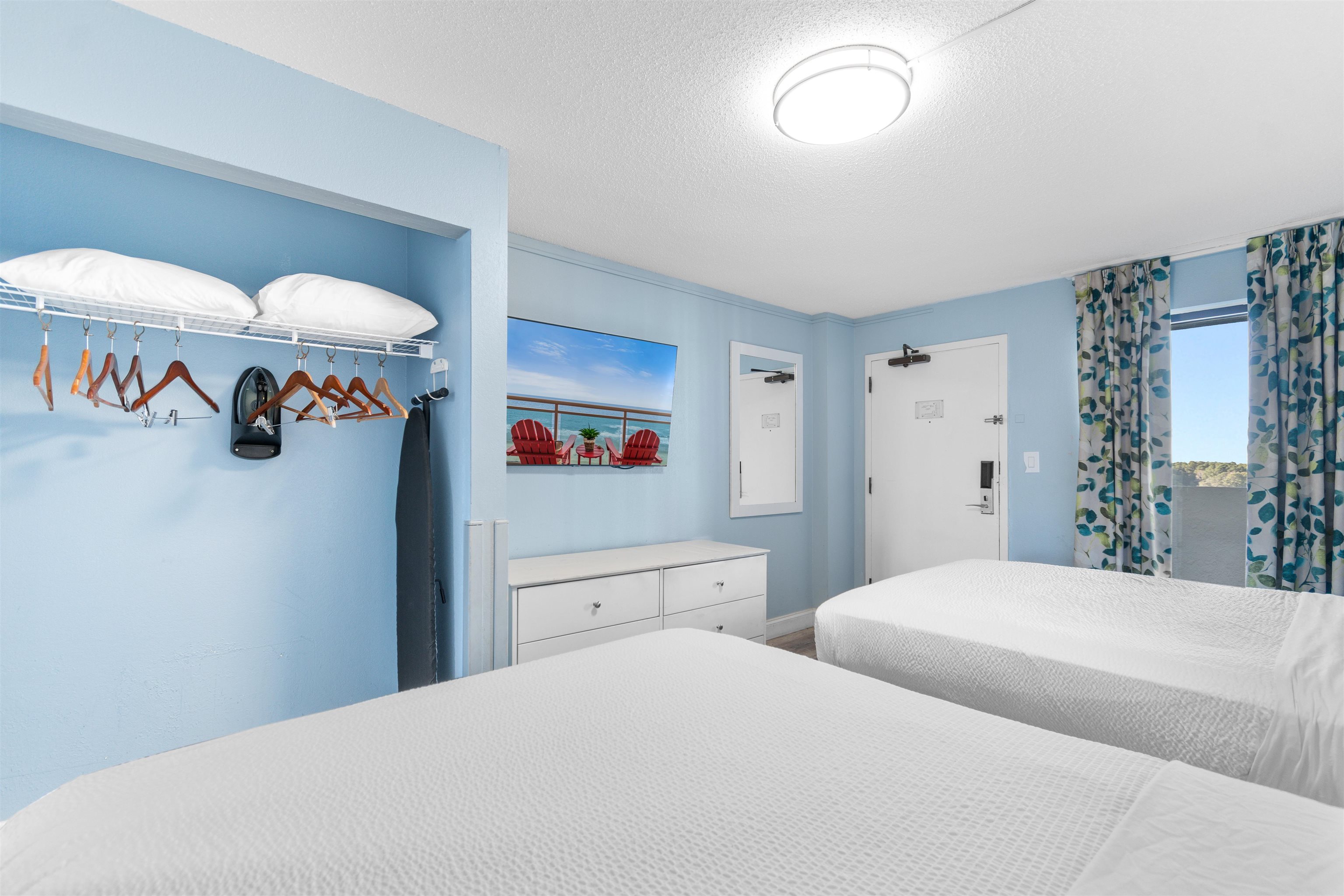 1501 South Ocean Boulevard, Unit 1237 Myrtle Beach, SC 29577 - Photo 10 of 40 Bedroom featuring a textured ceiling and baseboards