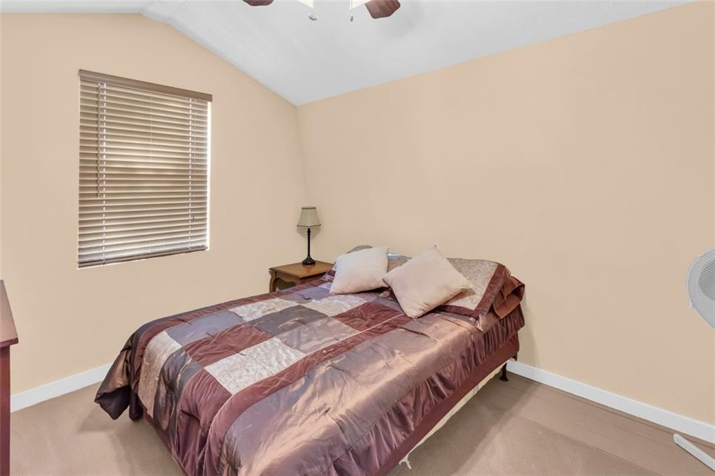 231 Lookout Ridge Road Cleveland, GA 30528 - Photo 14 of 20 a bedroom with a bed and a window