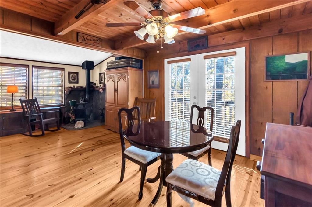 231 Lookout Ridge Road Cleveland, GA 30528 - Photo 5 of 20 a view of a dining room with furniture window and wooden floor