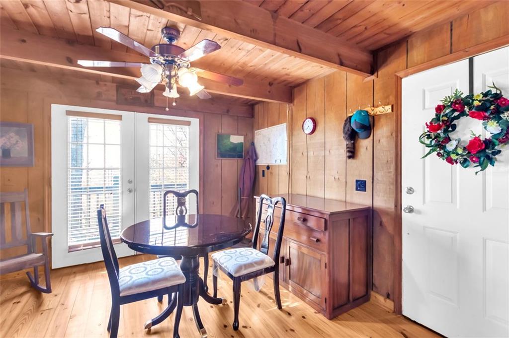 231 Lookout Ridge Road Cleveland, GA 30528 - Photo 6 of 20 a view of a dining room with furniture and a chandelier