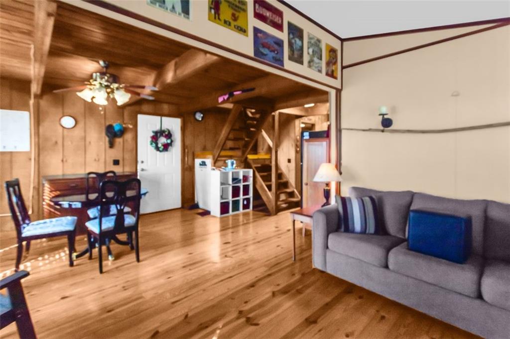 231 Lookout Ridge Road Cleveland, GA 30528 - Photo 8 of 20 a living room with furniture and wooden floor