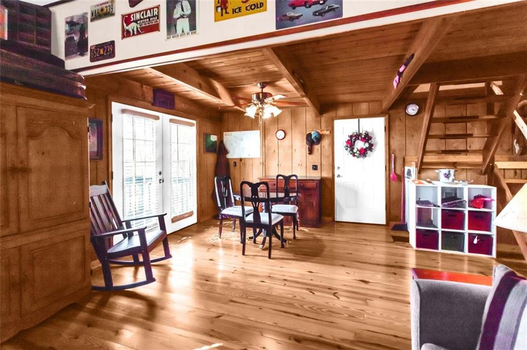 231 Lookout Ridge Road Cleveland, GA 30528 - Photo 9 of 20 a view of a chairs and table in a patio