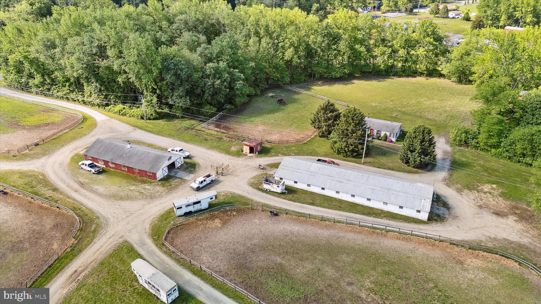 197-199 Pine Tree Road Townsend, DE 19734 - Photo 16 of 62 an aerial view of a house with a yard and lake