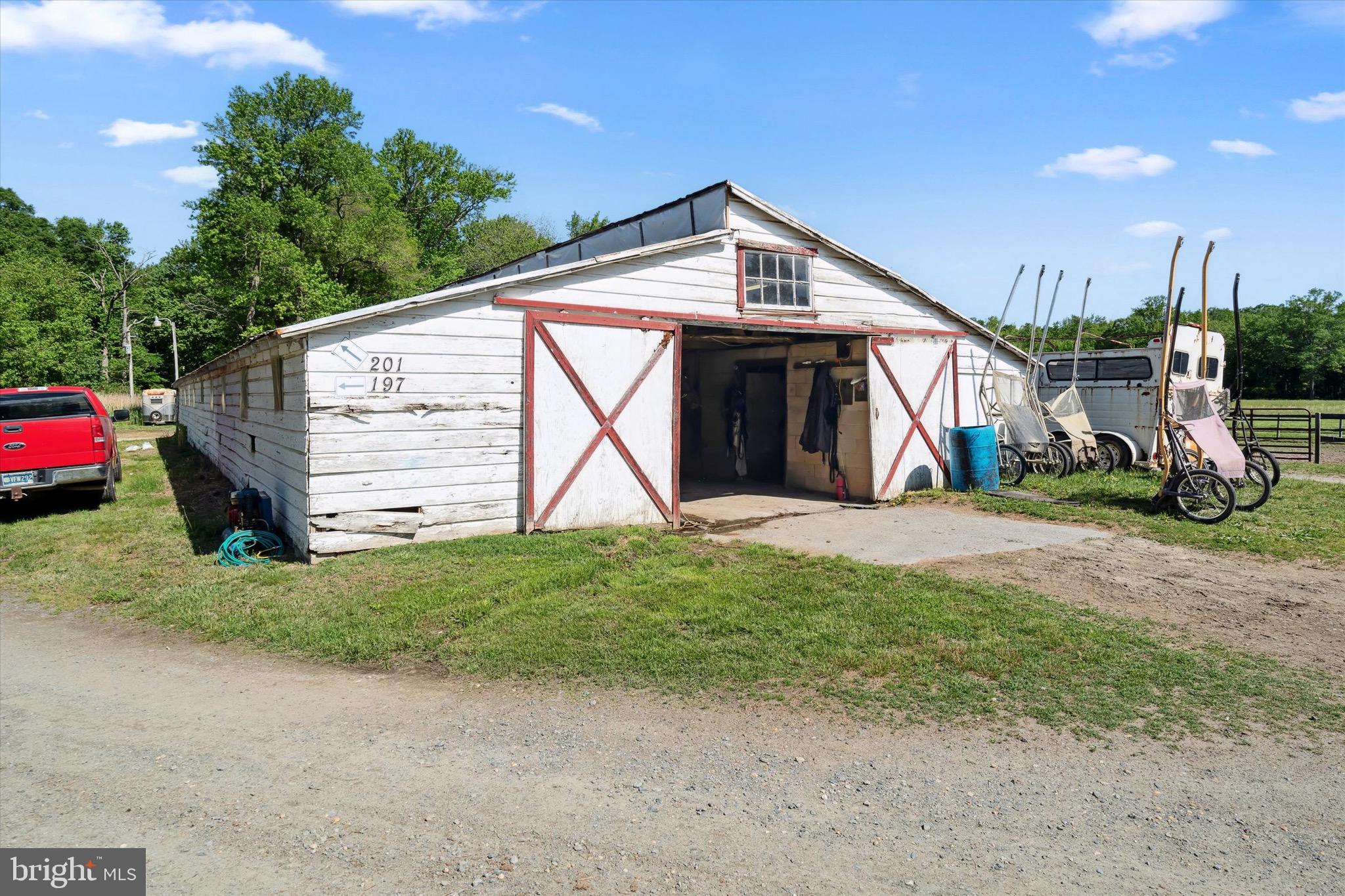 197-199 Pine Tree Road Townsend, DE 19734 - Photo 26 of 62 a view of an house with backyard and trees