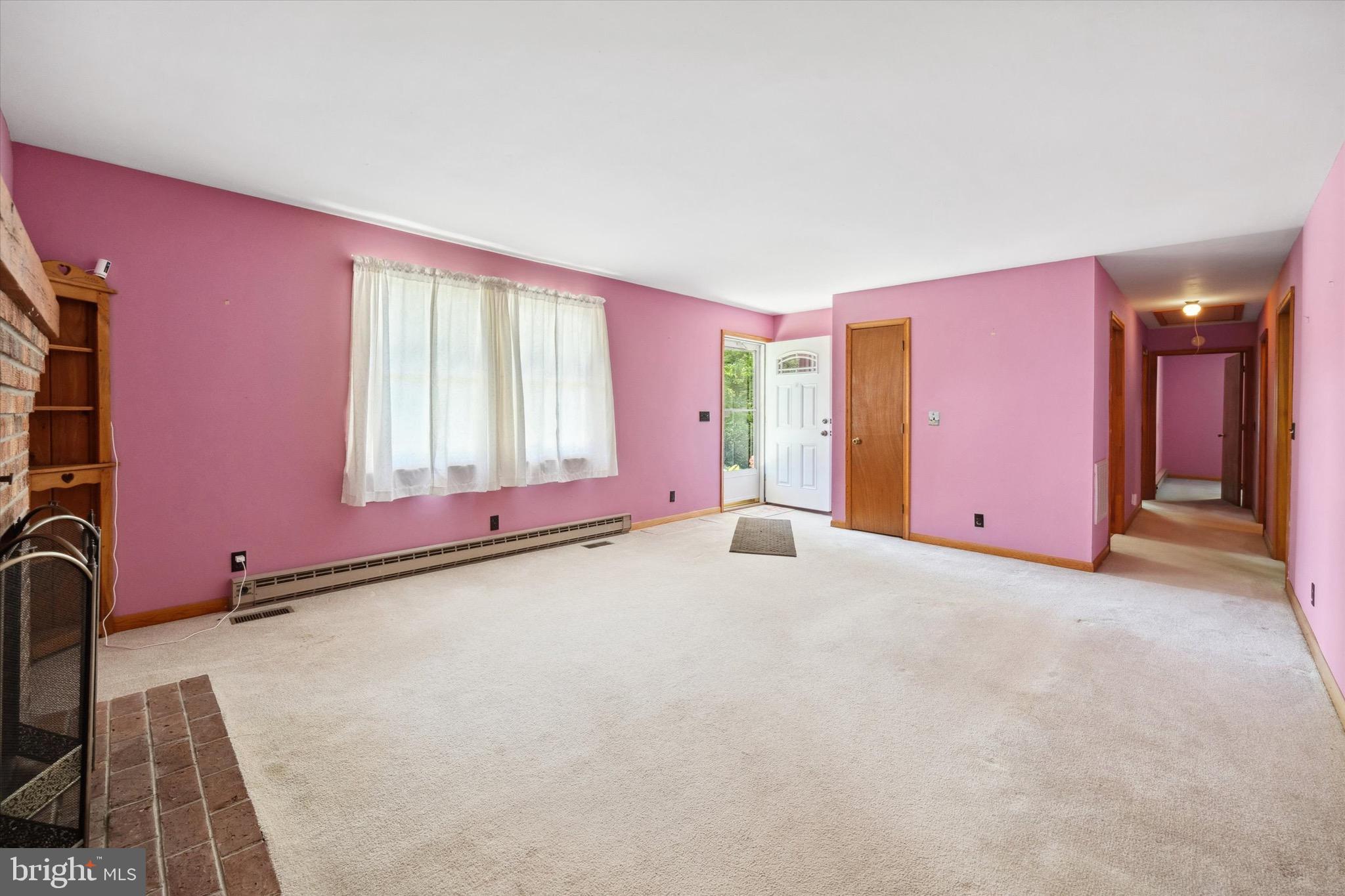 197-199 Pine Tree Road Townsend, DE 19734 - Photo 34 of 62 a big room with windows and a dresser