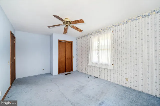 a view of a patio with swimming pool