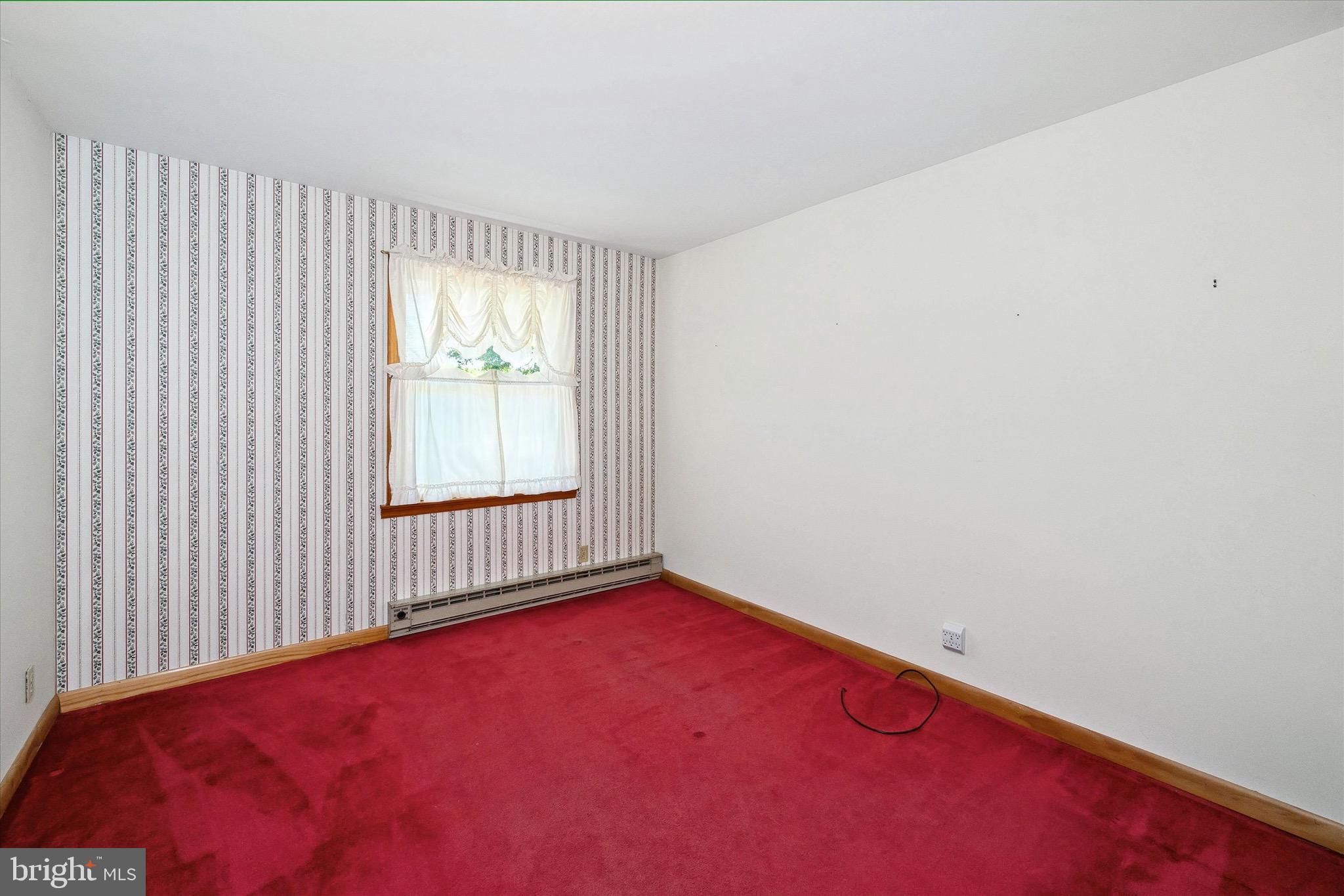 197-199 Pine Tree Road Townsend, DE 19734 - Photo 44 of 62 an empty room with a window