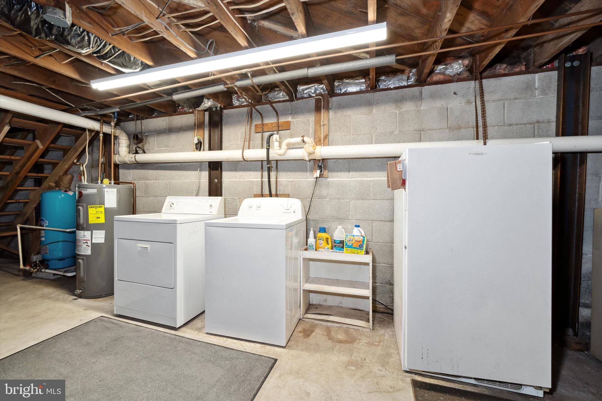 197-199 Pine Tree Road Townsend, DE 19734 - Photo 55 of 62 a utility room with dryer and washer
