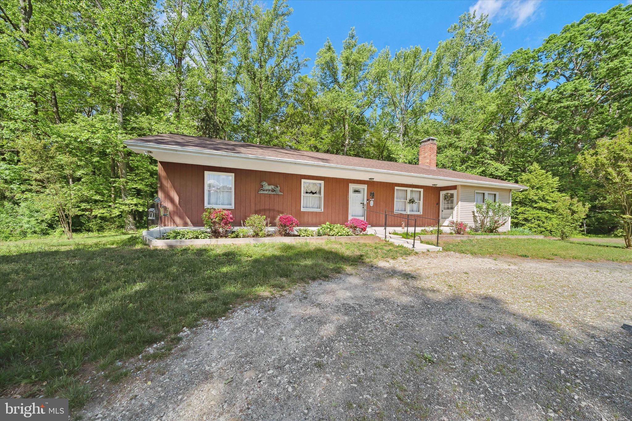 197-199 Pine Tree Road Townsend, DE 19734 - Photo 6 of 62 front view of house with a yard
