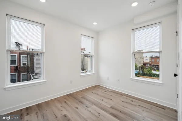 an empty room with windows