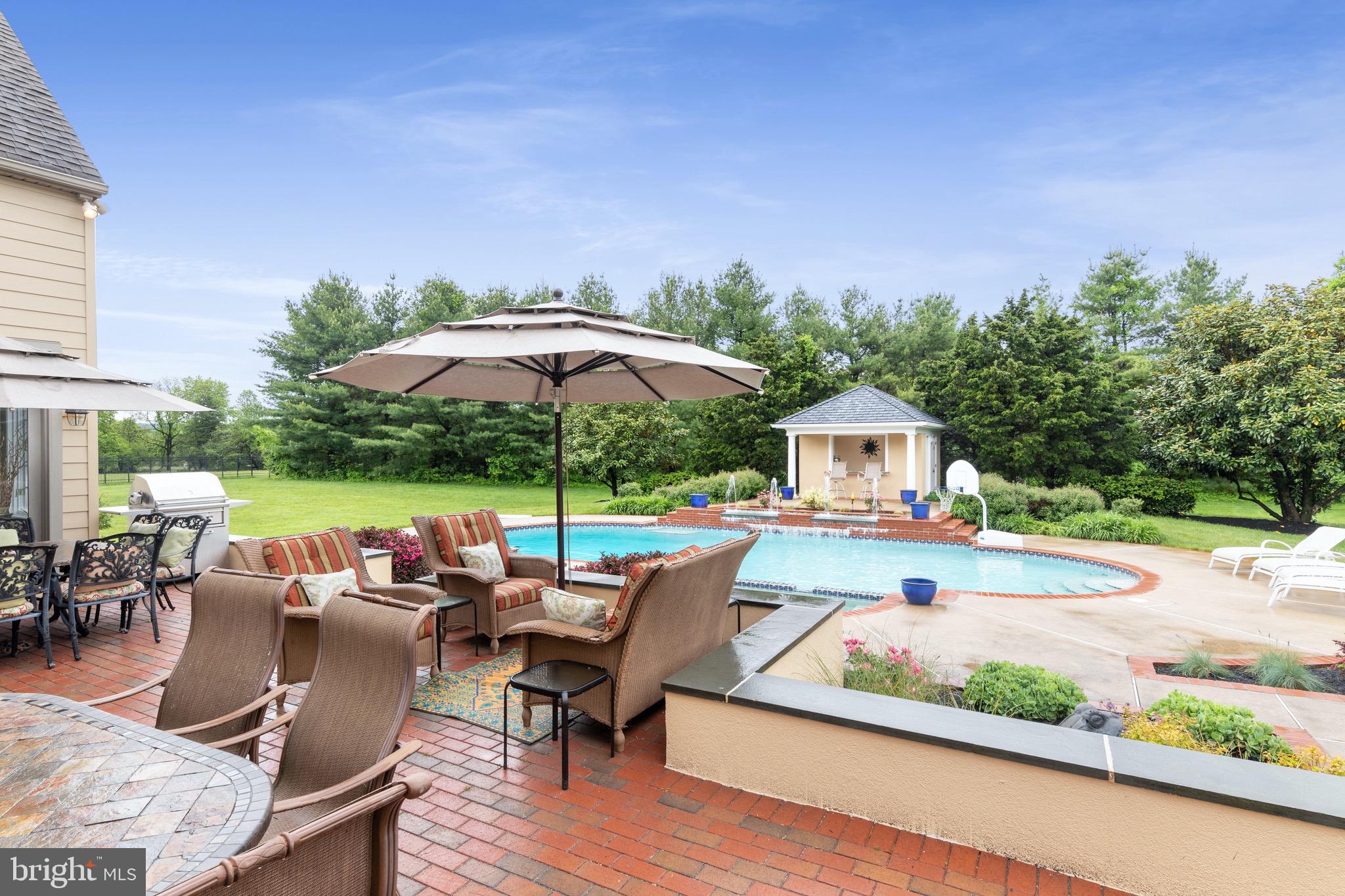 1860 Covered Bridge Road Malvern, PA 19355 - Photo 12 of 59 an outdoor space with furniture and umbrella