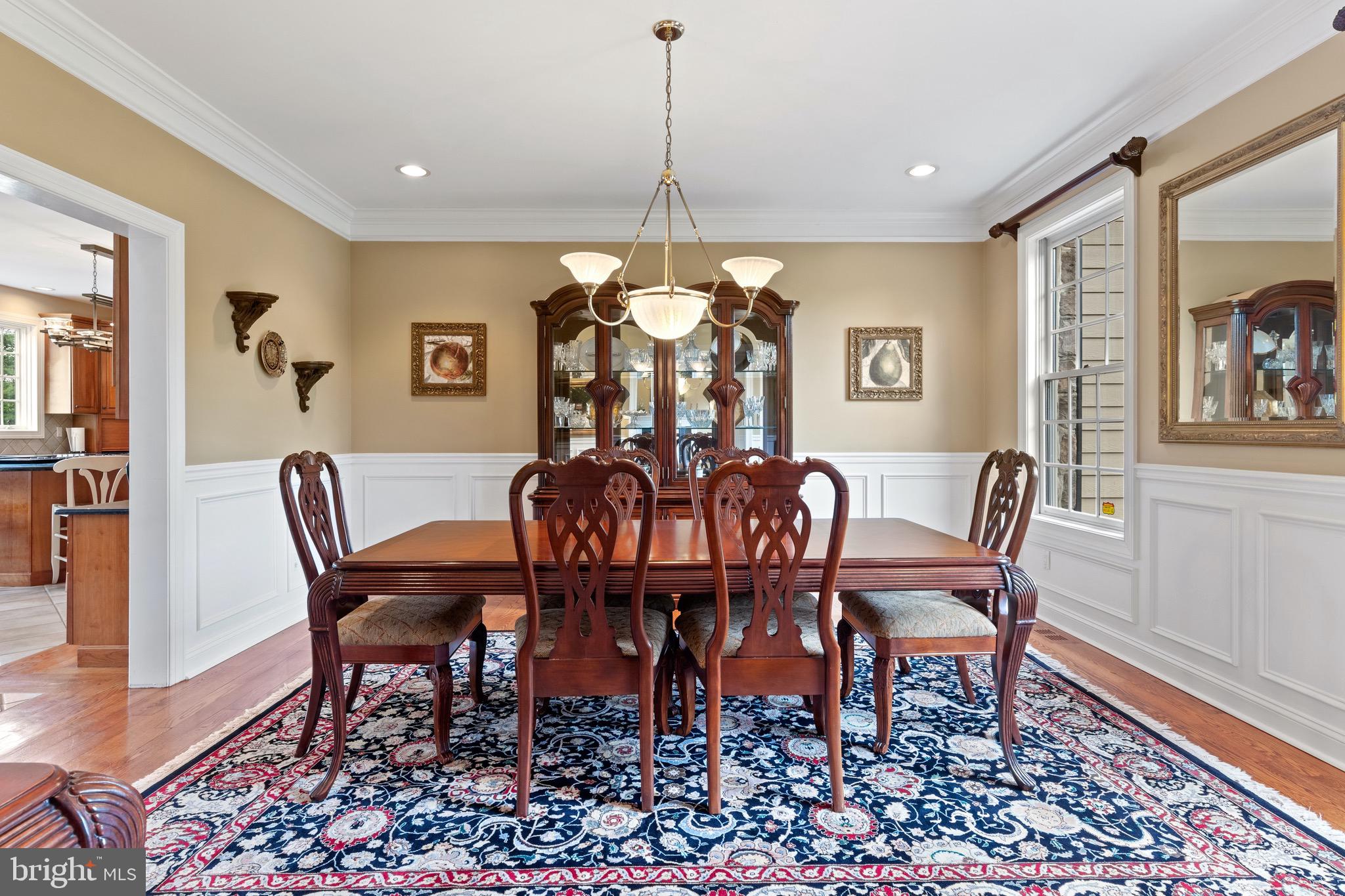 1860 Covered Bridge Road Malvern, PA 19355 - Photo 20 of 59 a dining room with furniture a rug and wooden floor