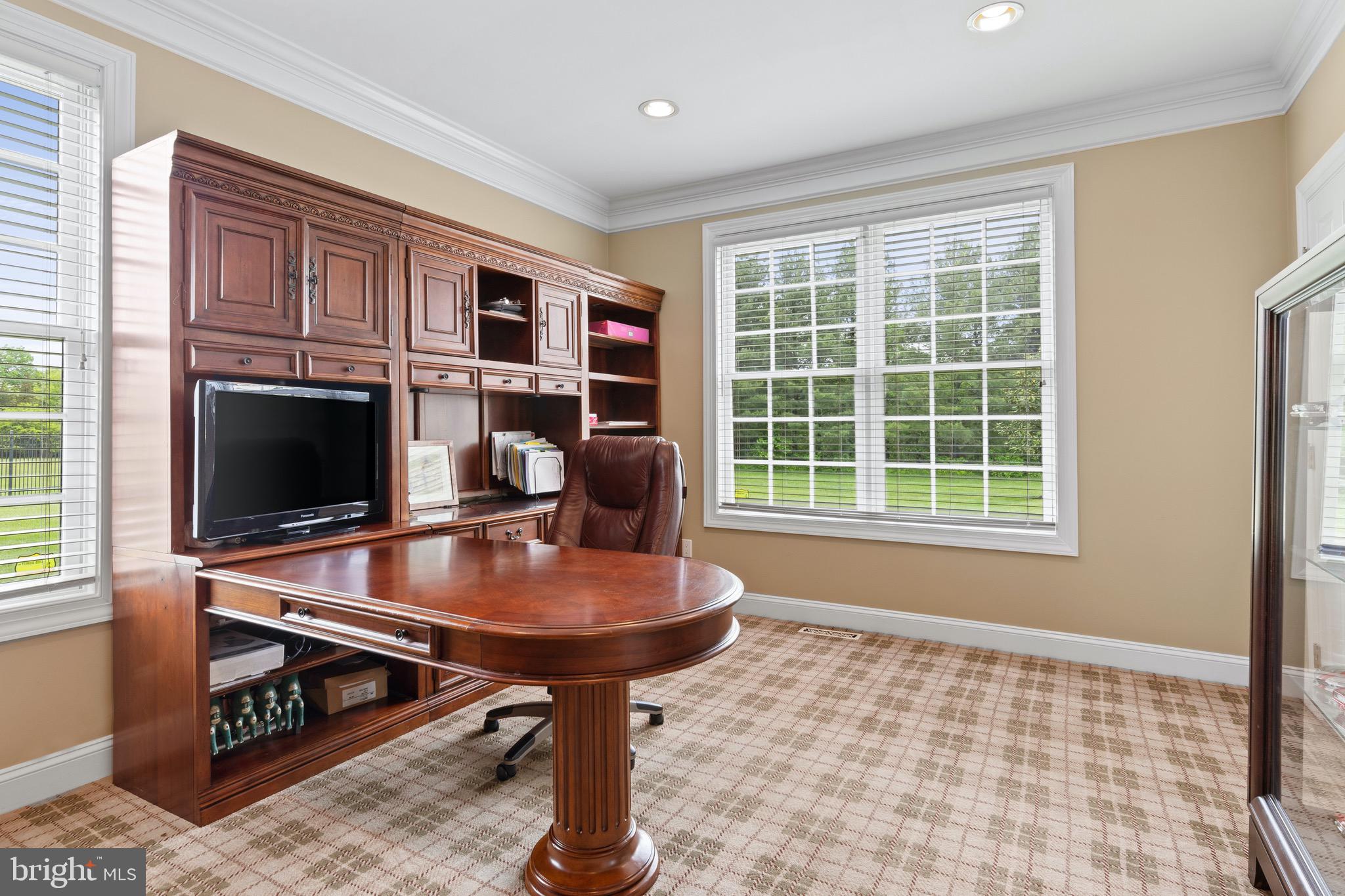 1860 Covered Bridge Road Malvern, PA 19355 - Photo 31 of 59 a living room with furniture a flat screen tv and a fireplace