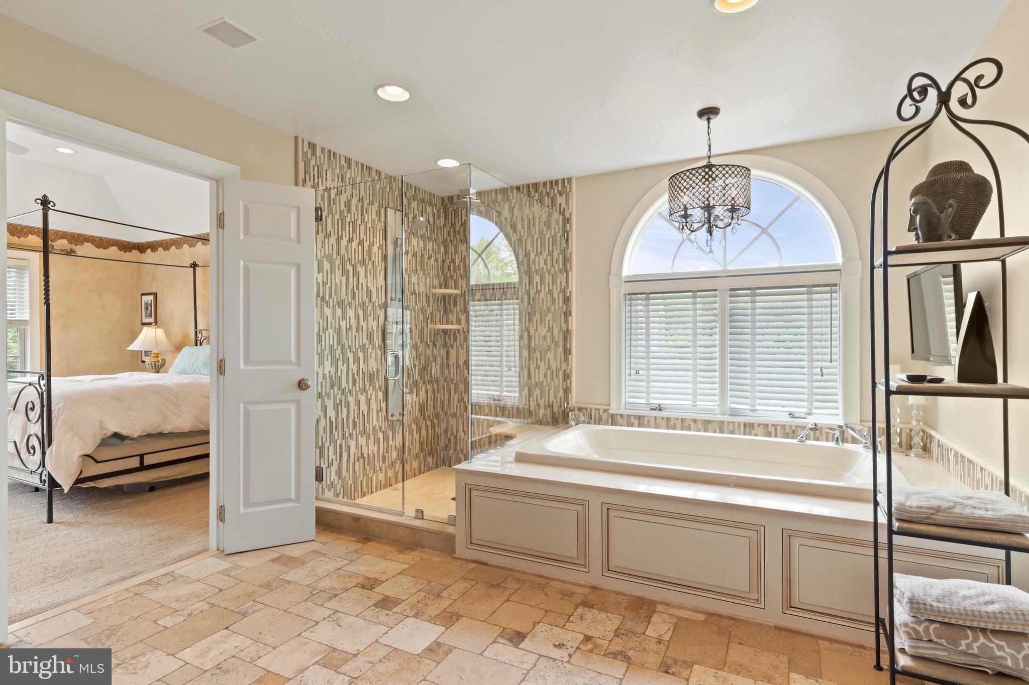 1860 Covered Bridge Road Malvern, PA 19355 - Photo 40 of 59 a spacious bathroom with a tub and shower