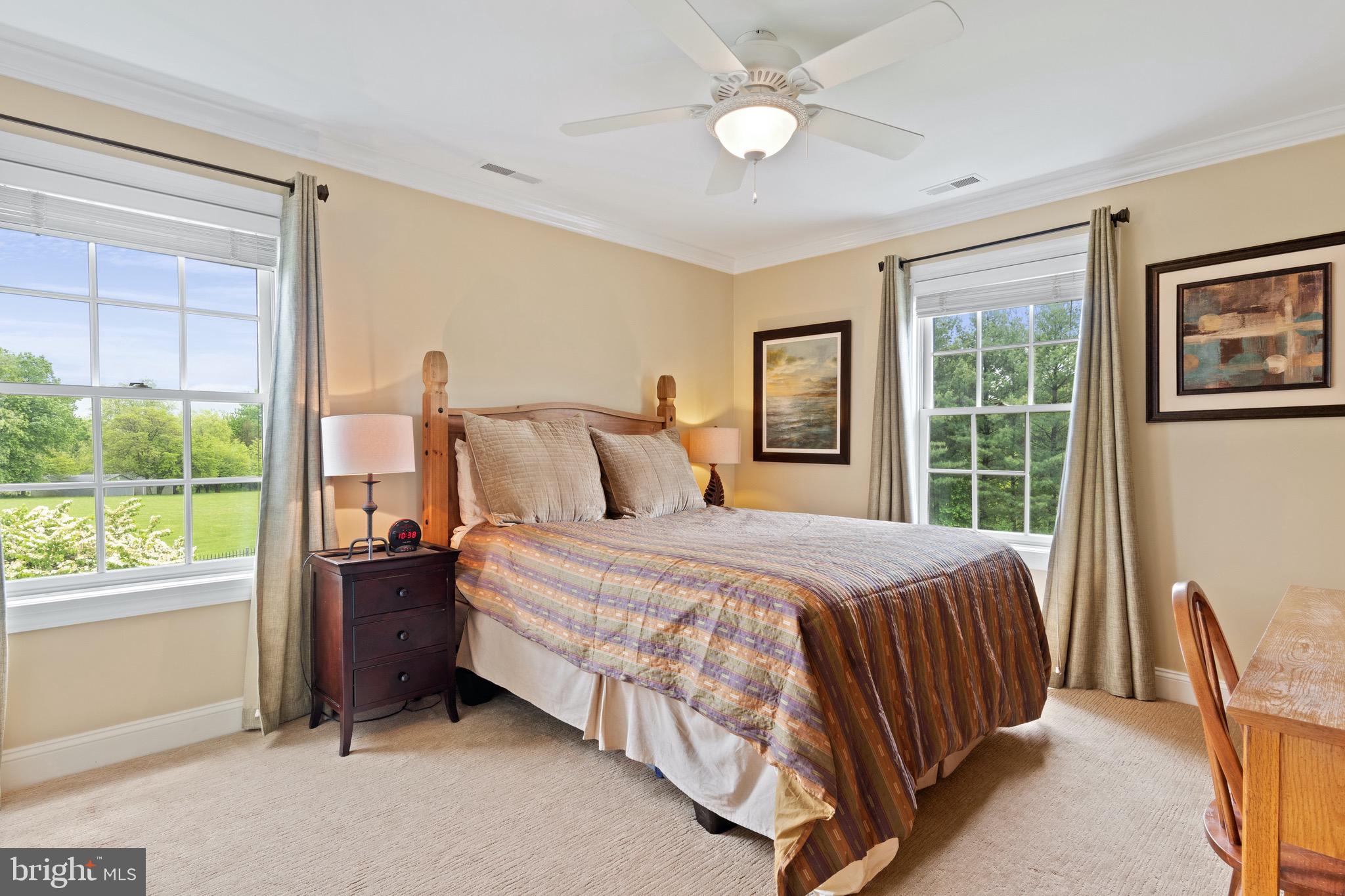 1860 Covered Bridge Road Malvern, PA 19355 - Photo 46 of 59 a bedroom with a bed and a large window
