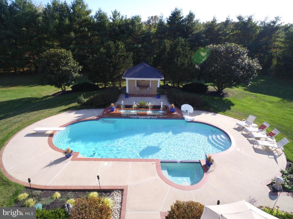 1860 Covered Bridge Road Malvern, PA 19355 - Photo 51 of 59 an aerial view of a house with yard swimming pool and outdoor seating