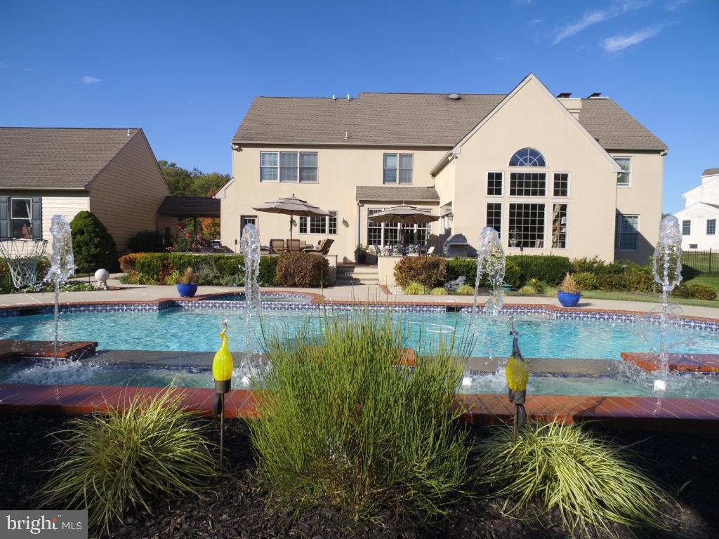 1860 Covered Bridge Road Malvern, PA 19355 - Photo 52 of 59 a front view of a house with garden