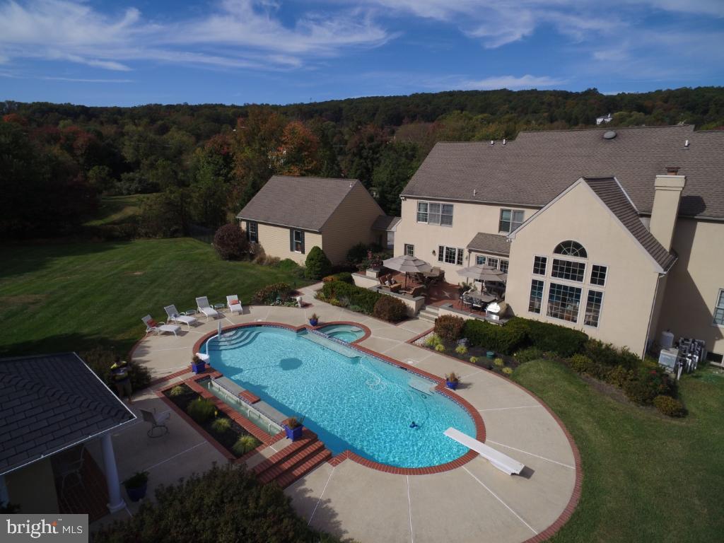 1860 Covered Bridge Road Malvern, PA 19355 - Photo 58 of 59 an aerial view of a house with outdoor space and a lake view