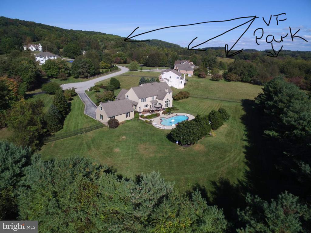 1860 Covered Bridge Road Malvern, PA 19355 - Photo 59 of 59 an aerial view of a house with garden space and street view