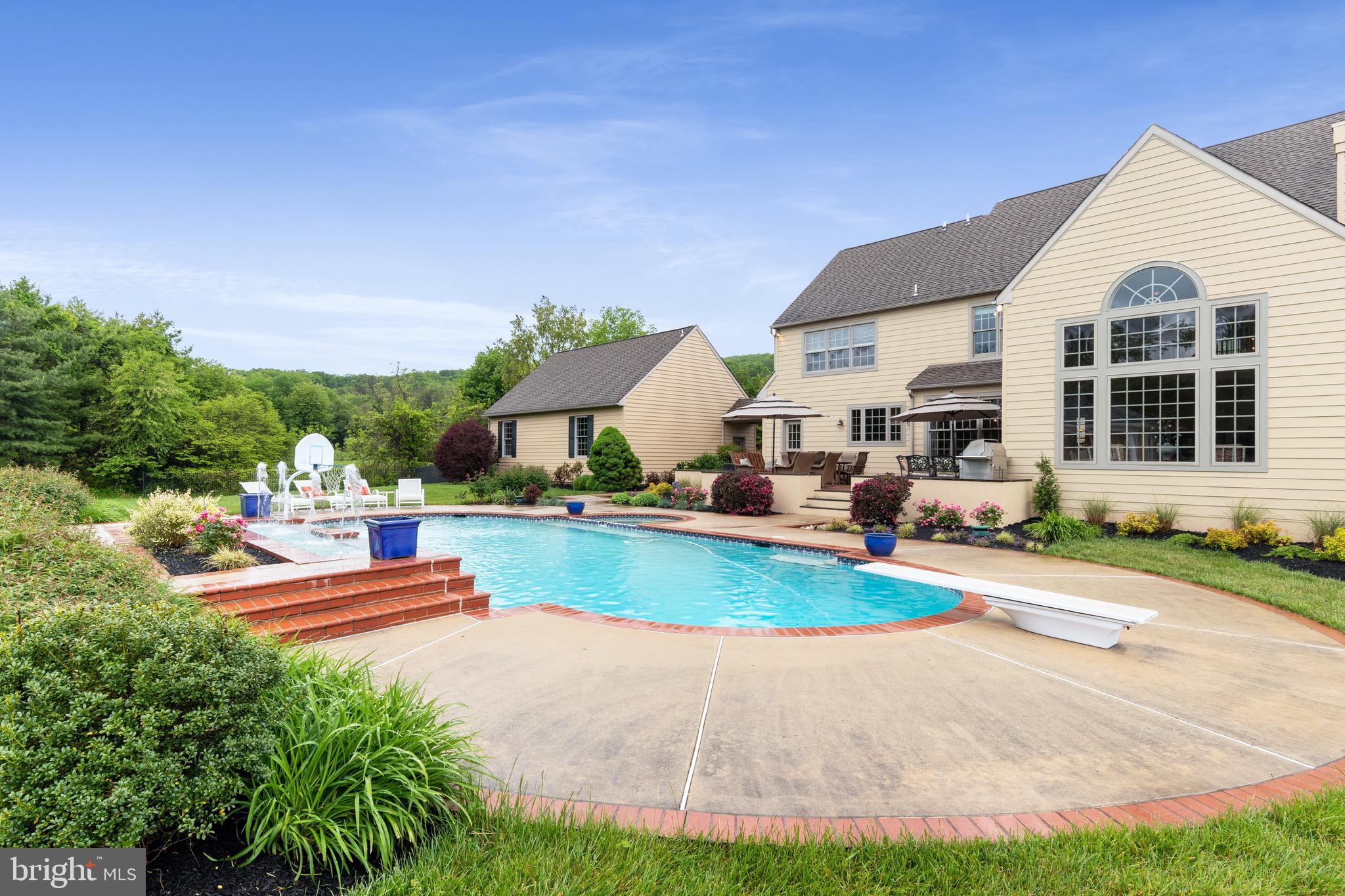 1860 Covered Bridge Road Malvern, PA 19355 - Photo 9 of 59 a view of a house with entertaining space and a yard