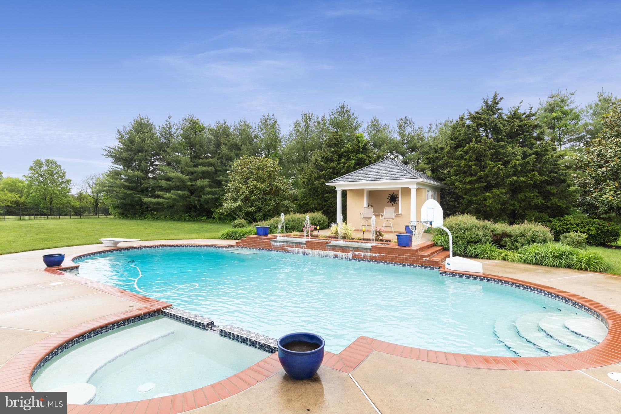 1860 Covered Bridge Road Malvern, PA 19355 - Photo 10 of 59 a view of a swimming pool and lounge chairs