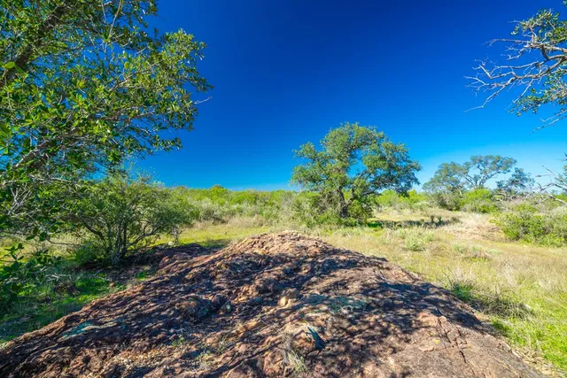 a view of a lake with a big yard