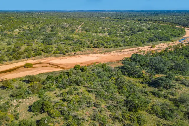 a fire hydrant in the middle of a field