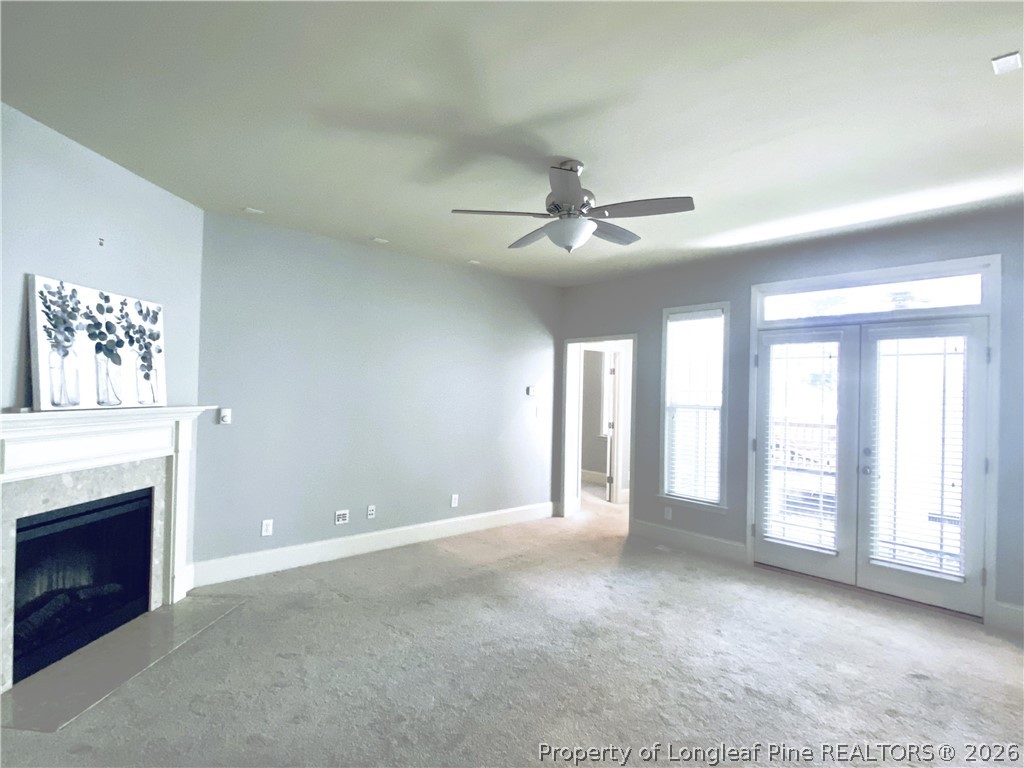 175 Pine Hawk Drive Spring Lake, NC 28390 - Photo 12 of 43 a view of an empty room with a fireplace