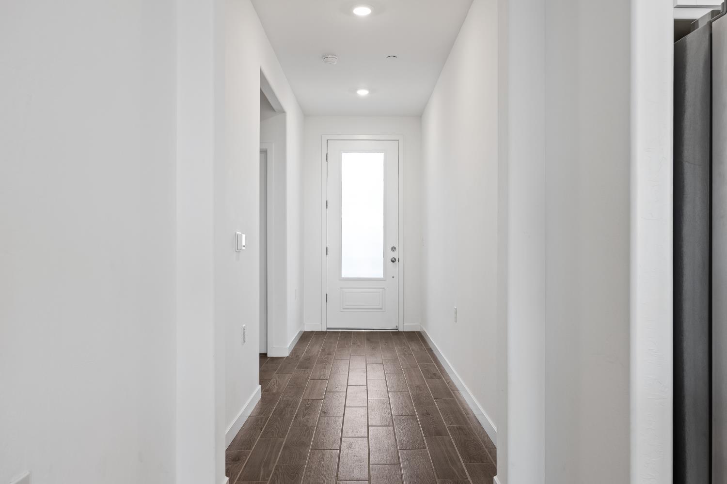 2601 Auburn Street Lemoore, CA 93245 - Photo 4 of 29 a view of hallway with wooden floor
