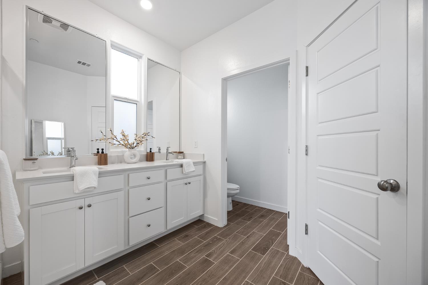 2601 Auburn Street Lemoore, CA 93245 - Photo 8 of 29 a bathroom with a double vanity sink and mirror