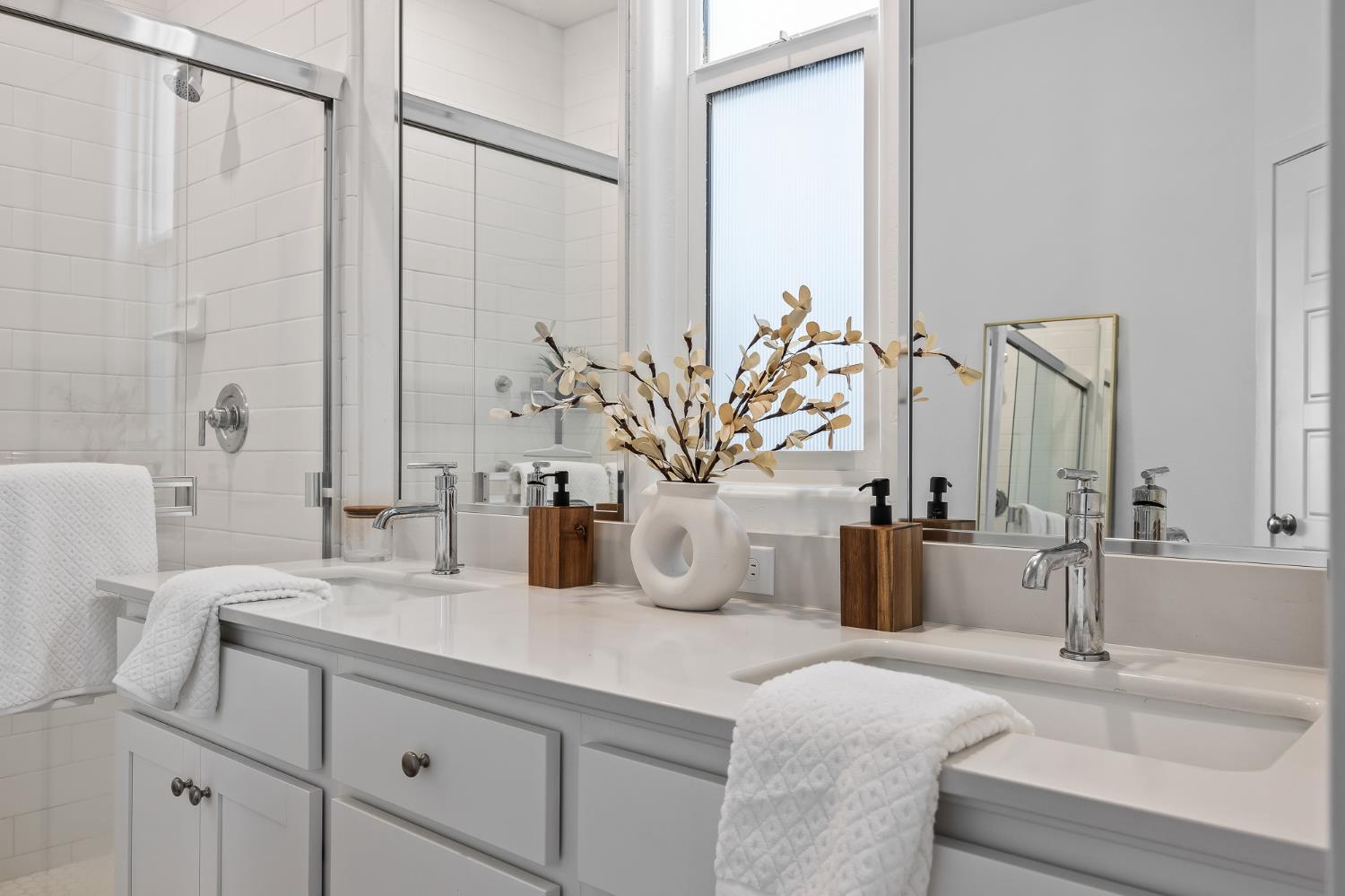 2601 Auburn Street Lemoore, CA 93245 - Photo 10 of 29 a bathroom with a double vanity sink and a mirror
