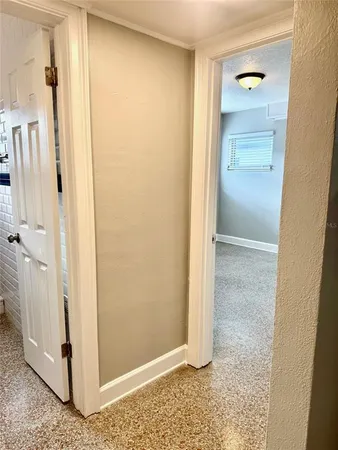 a view of a bathroom with a glass shower door