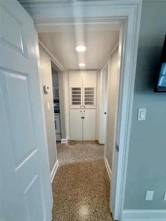 a view of entryway with window and stairs