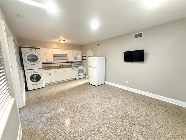 a view of kitchen and washer and dryer