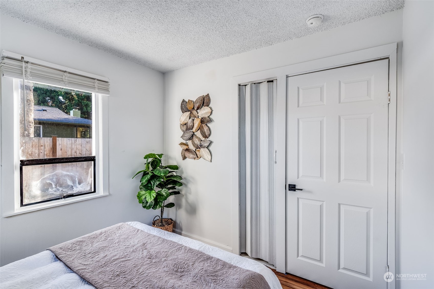 3617 Northeast 12th Street Renton, WA 98056 - Photo 18 of 33 a bedroom with a bed and a window