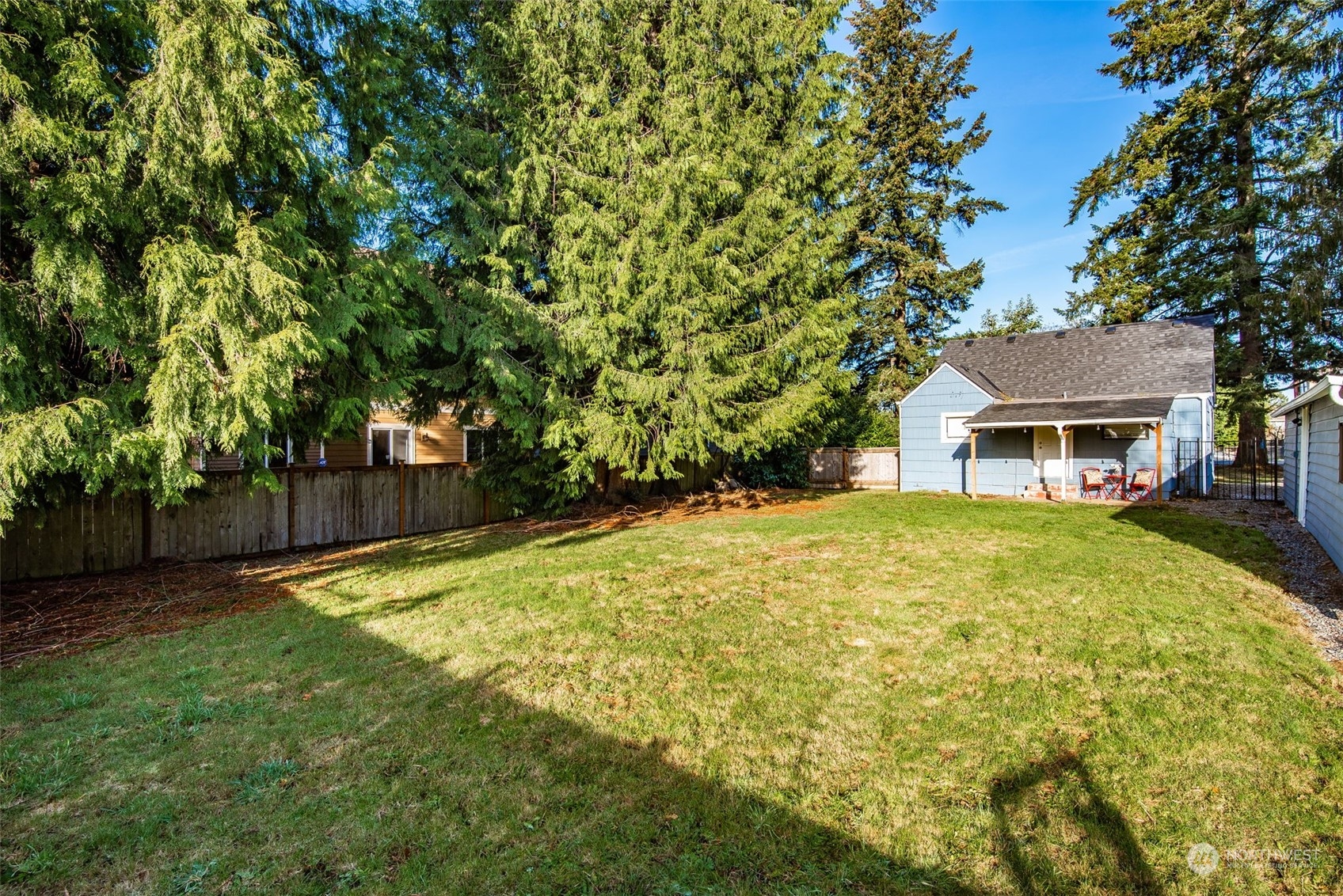 3617 Northeast 12th Street Renton, WA 98056 - Photo 25 of 33 a front view of a house with a garden